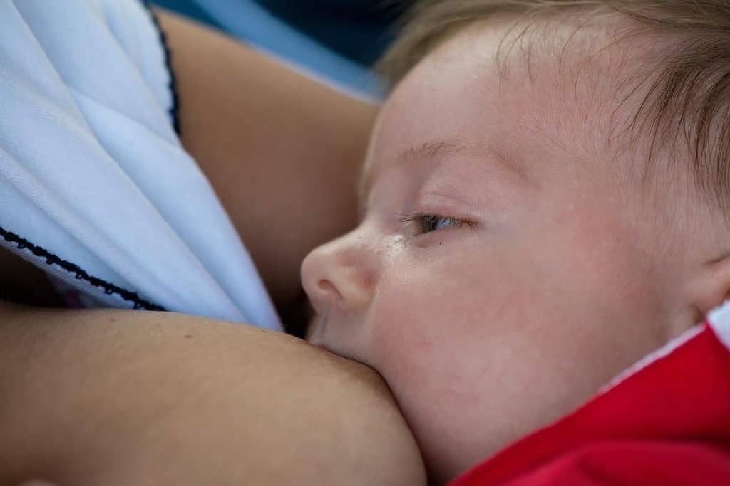 baby drinking breast milk