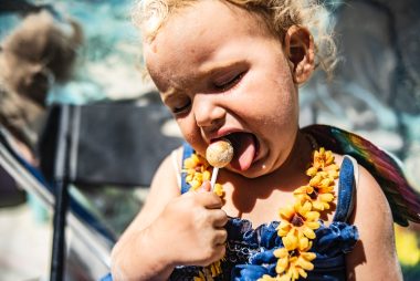 baby eating lollipop
