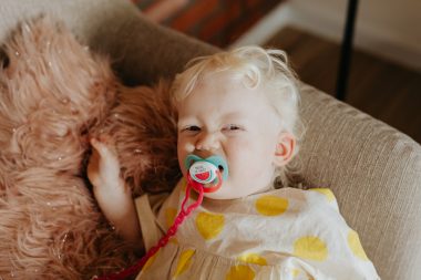 baby girl with pacifier
