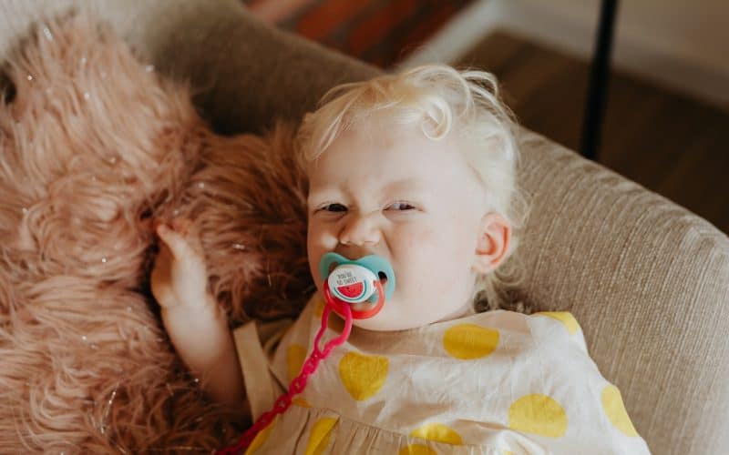 baby girl with pacifier