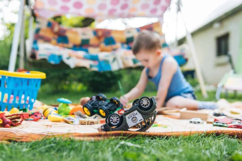 boy playing in the backyard