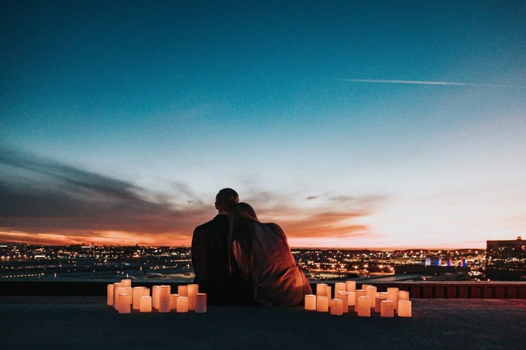 couple surrounded by candles