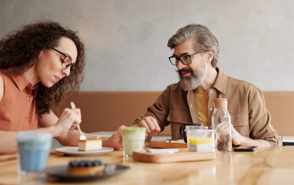 man and woman at a coffee shop