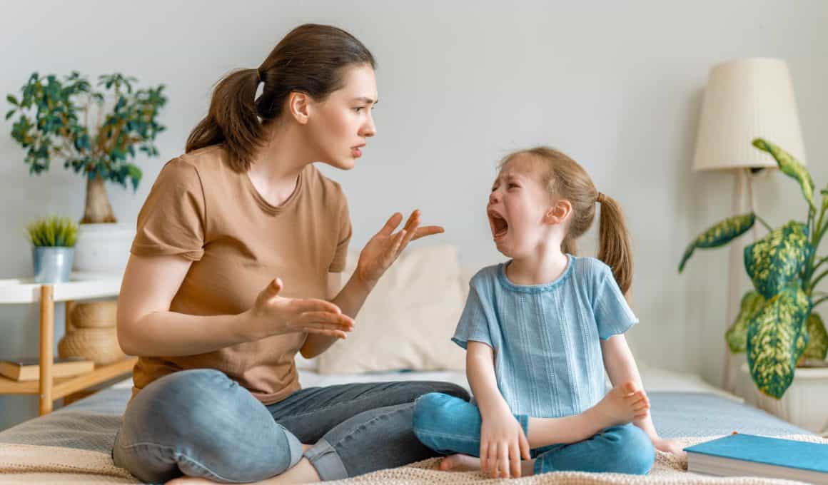 mom scolding crying child