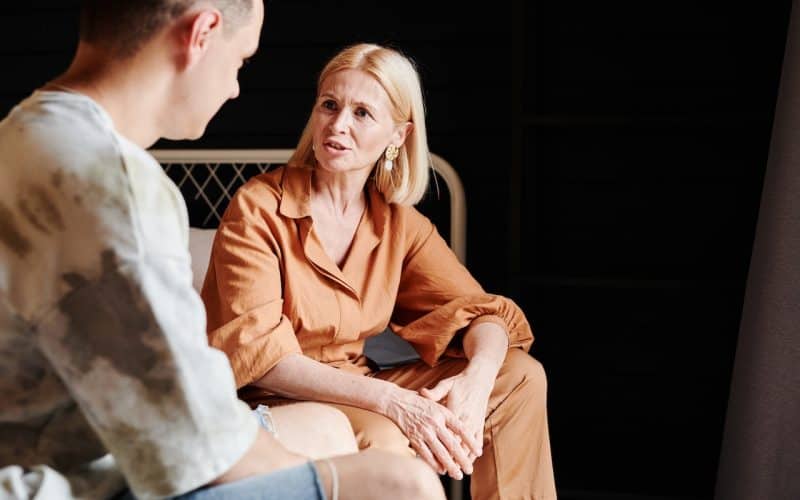 mother and son talking