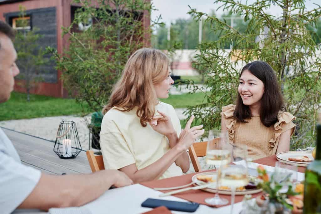 parents talking to daughter