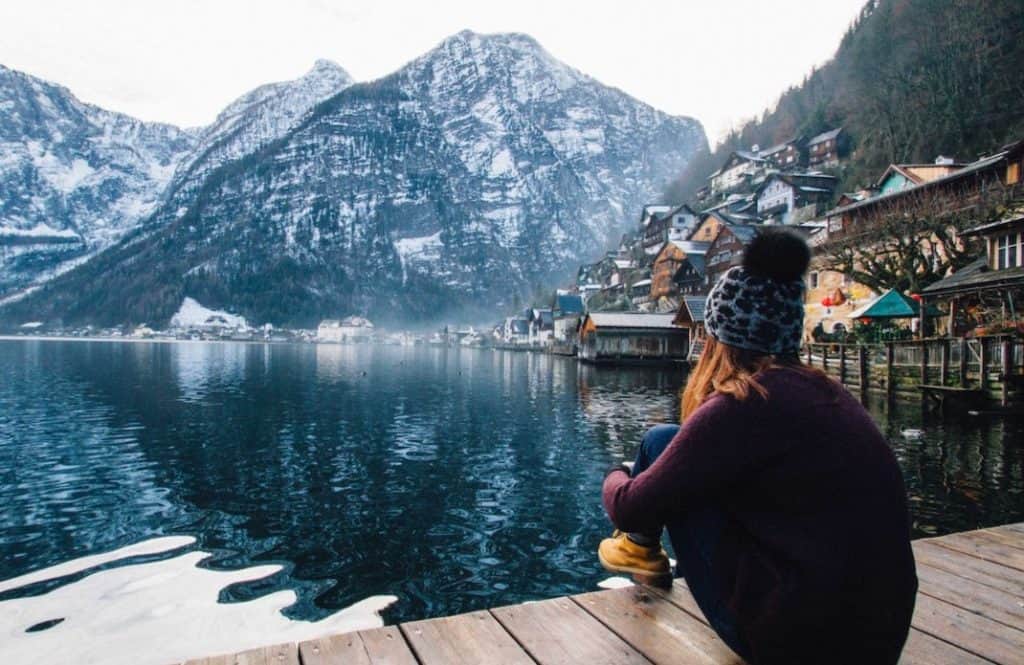 woman sitting on a dock