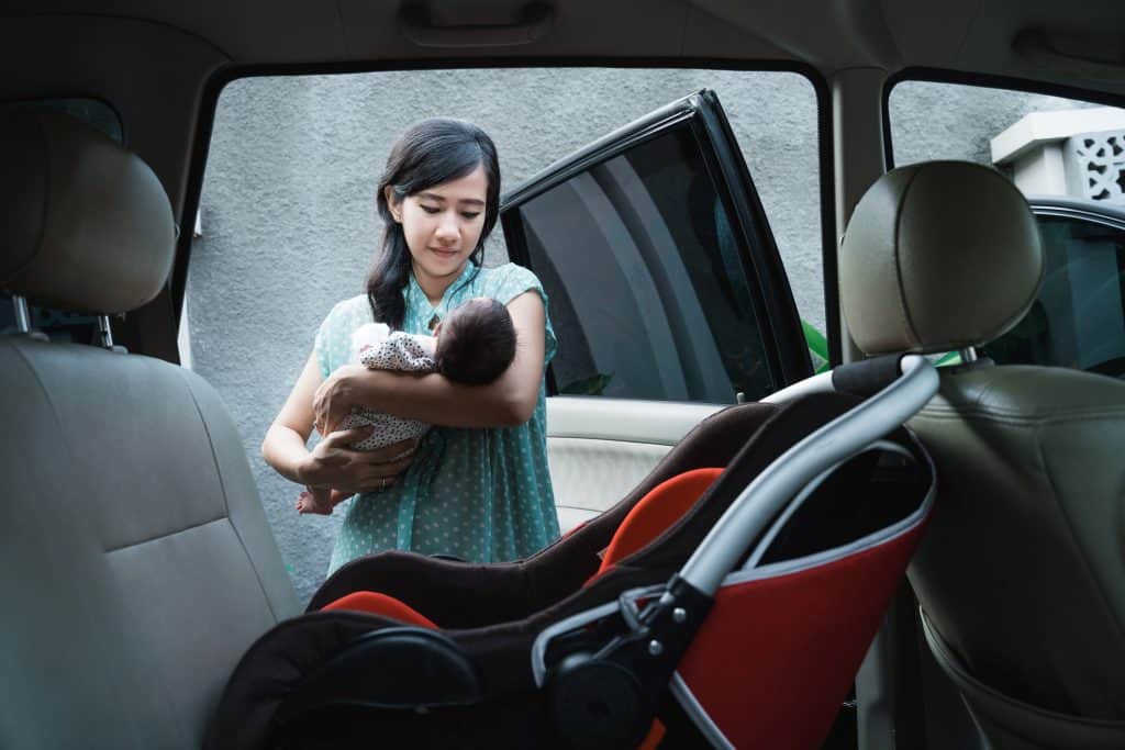 mom holding a baby