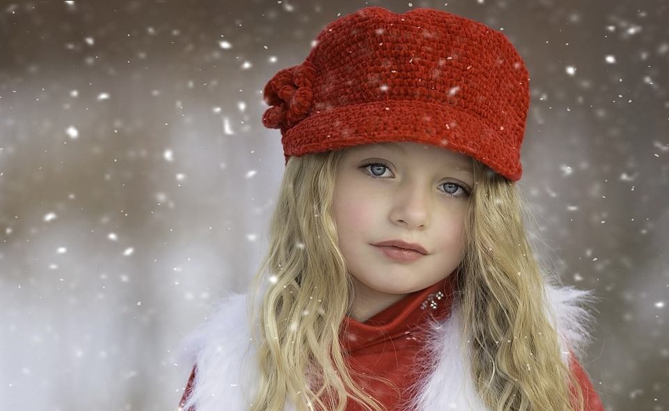 pretty little girl wearing Christmas attire