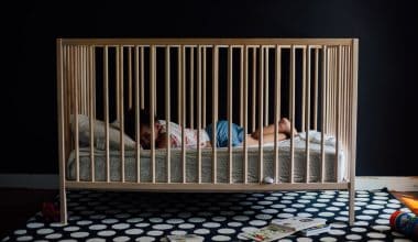 toddler on a crib
