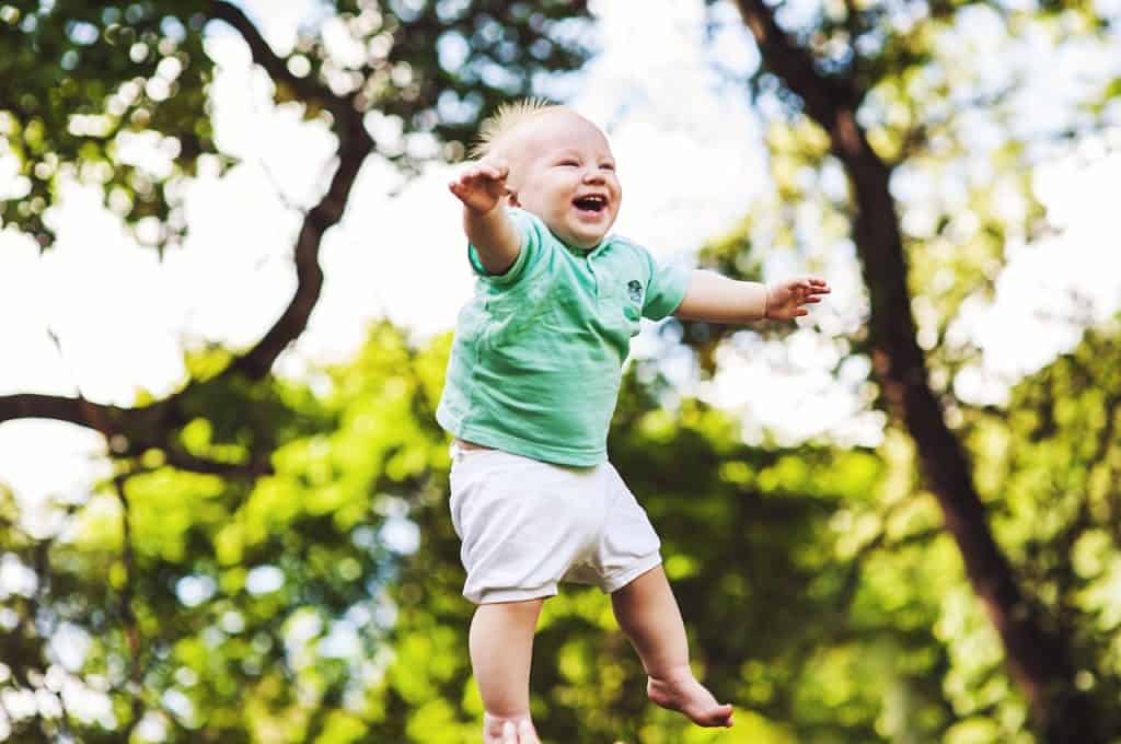 baby boy floating on air