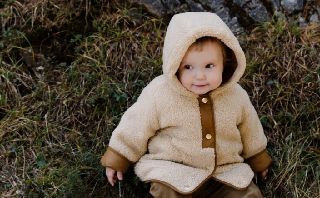 baby boy wearing brown hoodie