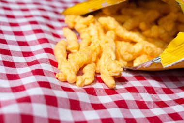 cheetos on a striped cloth