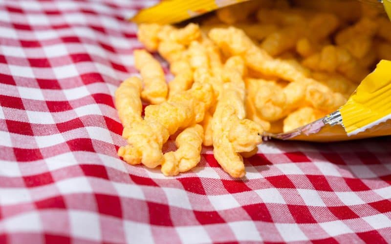 cheetos on a striped cloth