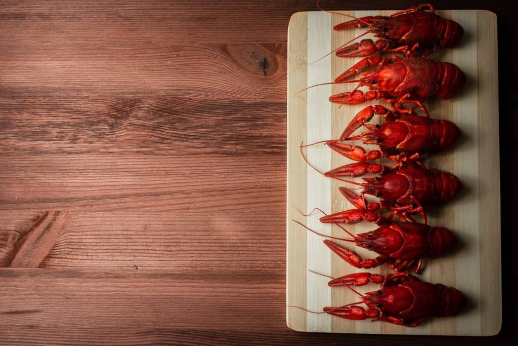 crawfish in wooden board