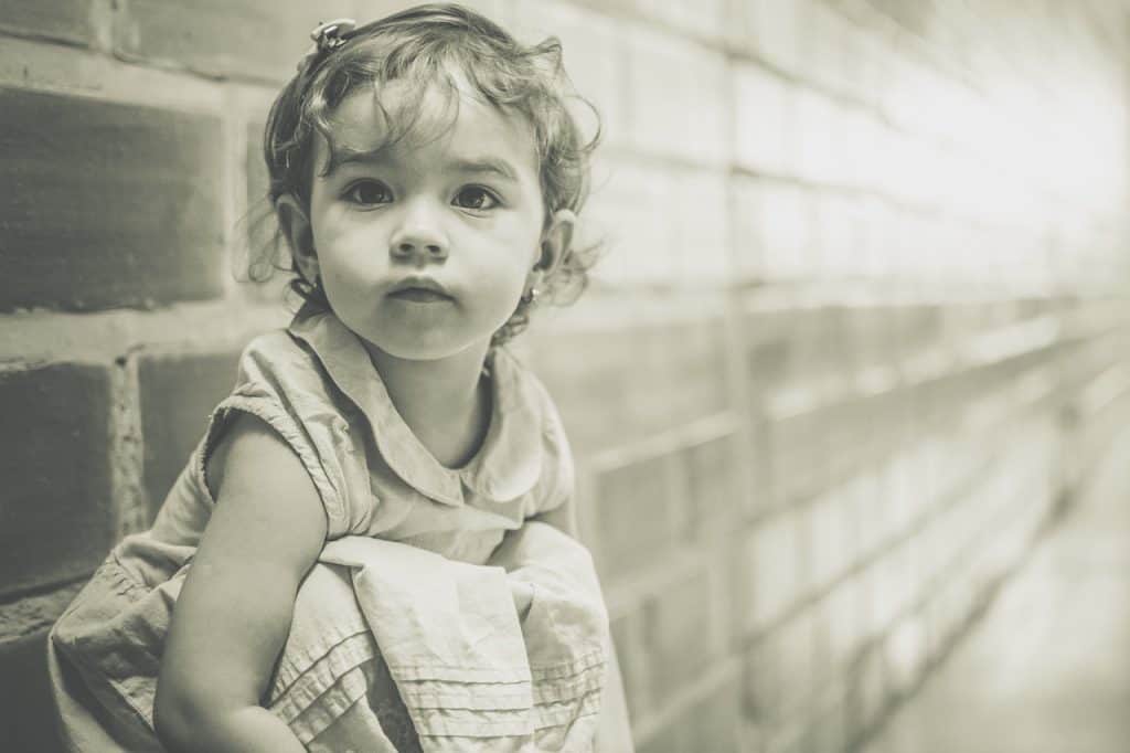 grayscale photo of little girl