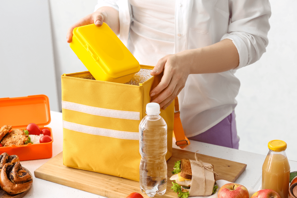 mom packing her kid's lunch