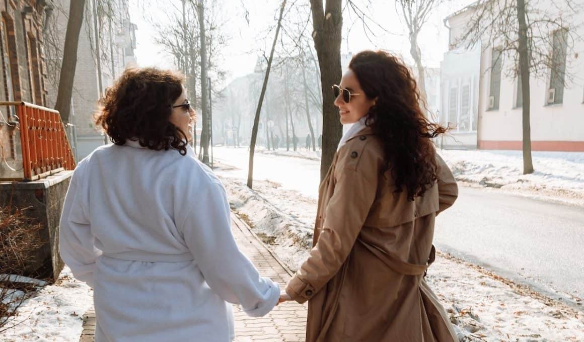 mother and daughter holding hands