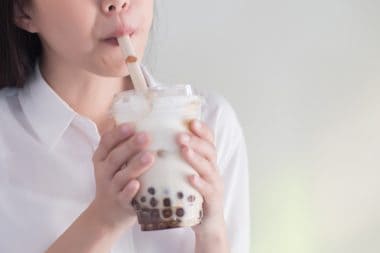 woman drinking bubble milk tea