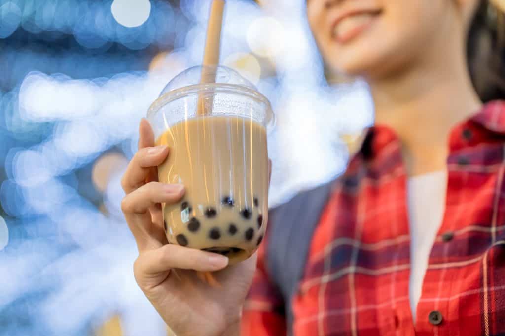 woman holding bubble tea