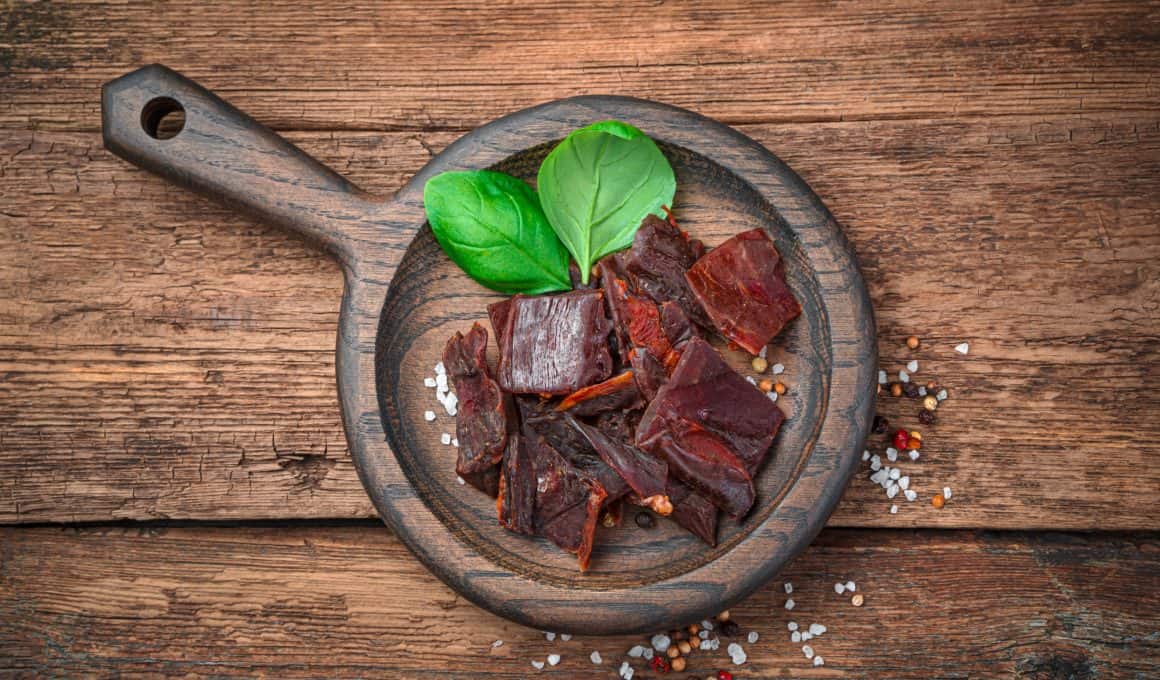 beef jerky on wooden pan