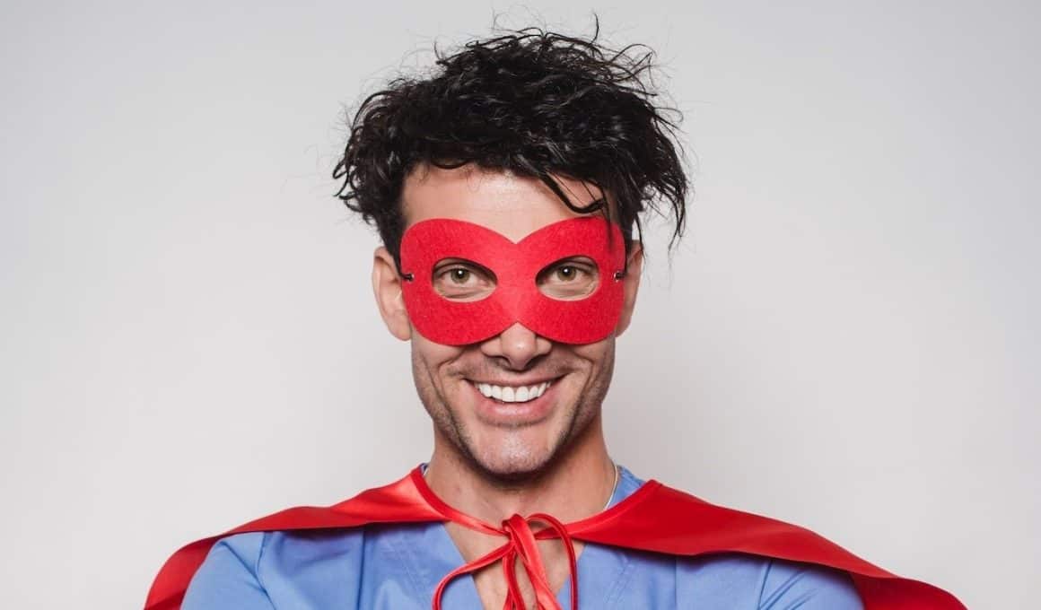 doctor wearing superhero costume
