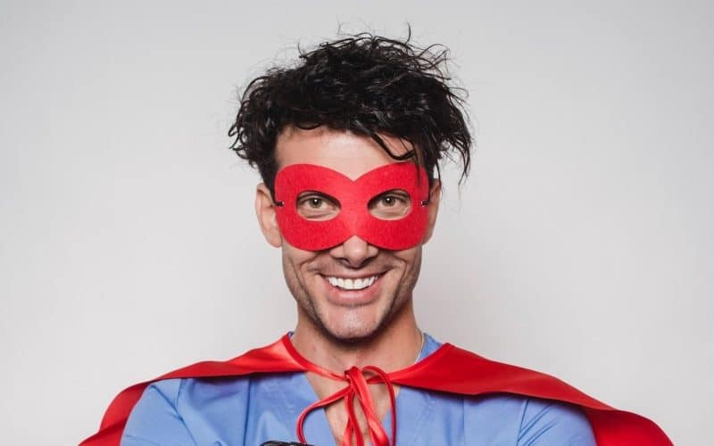 doctor wearing superhero costume