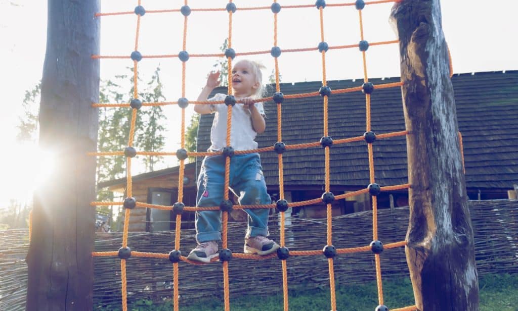 kid climbing ropes