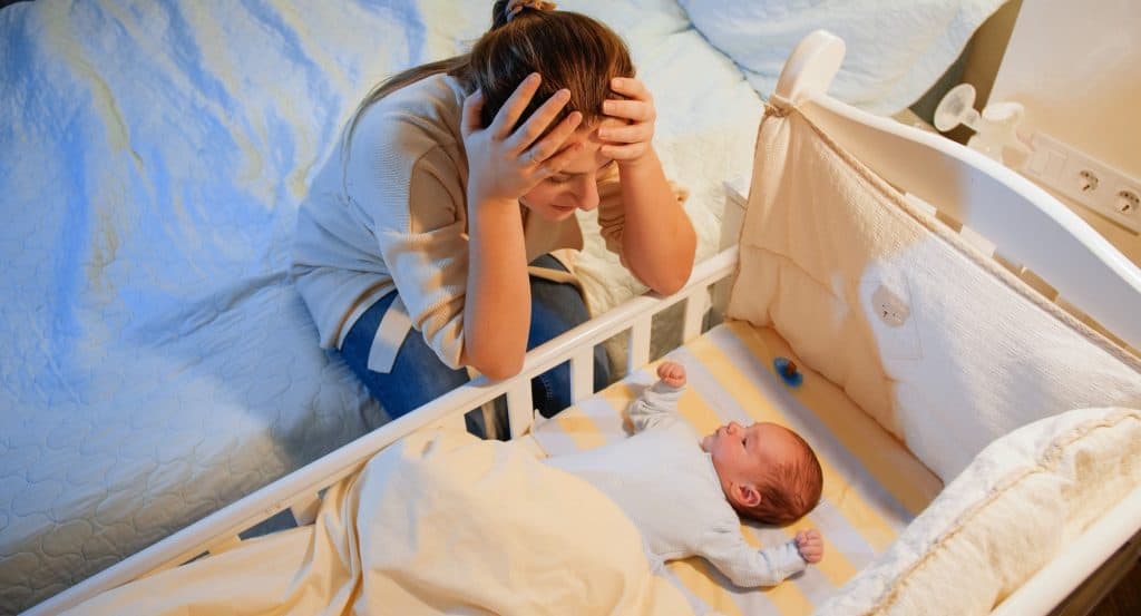 mom watching baby