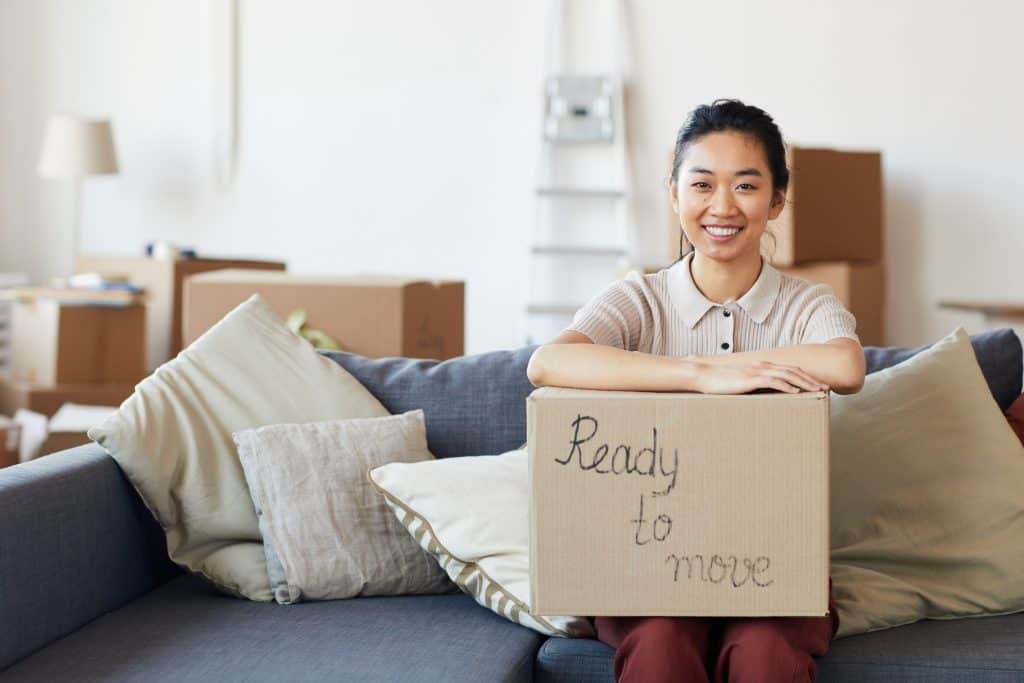 woman holding a box