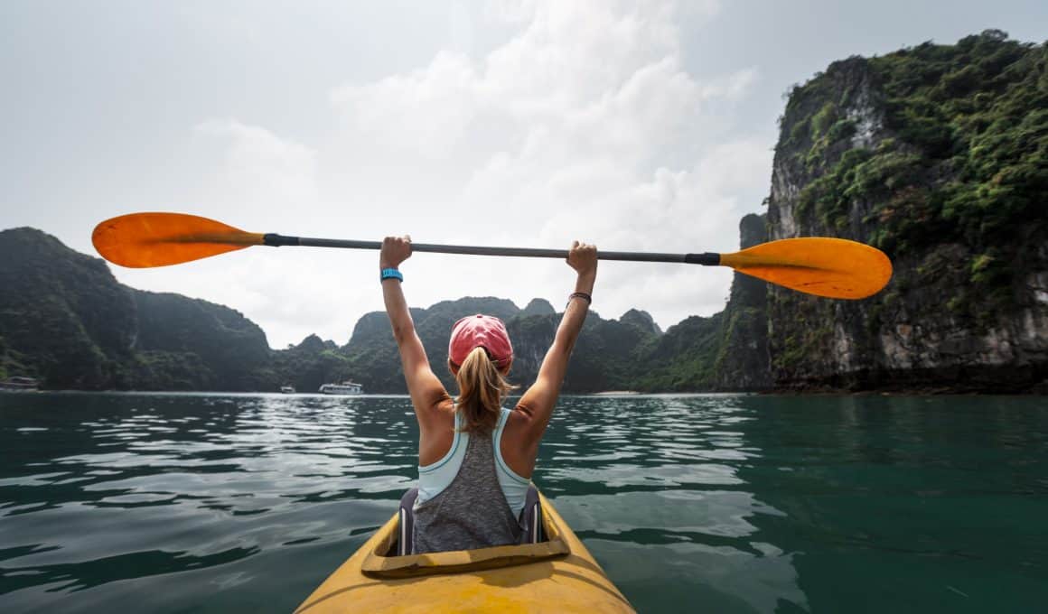woman sitting on a kayak
