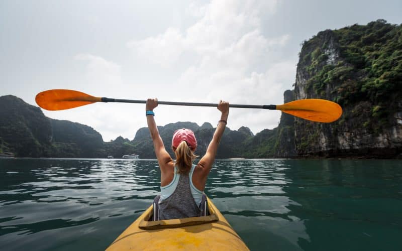 woman sitting on a kayak
