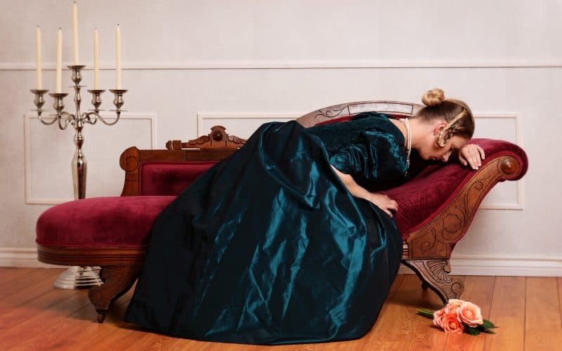 woman sleeping on a daybed