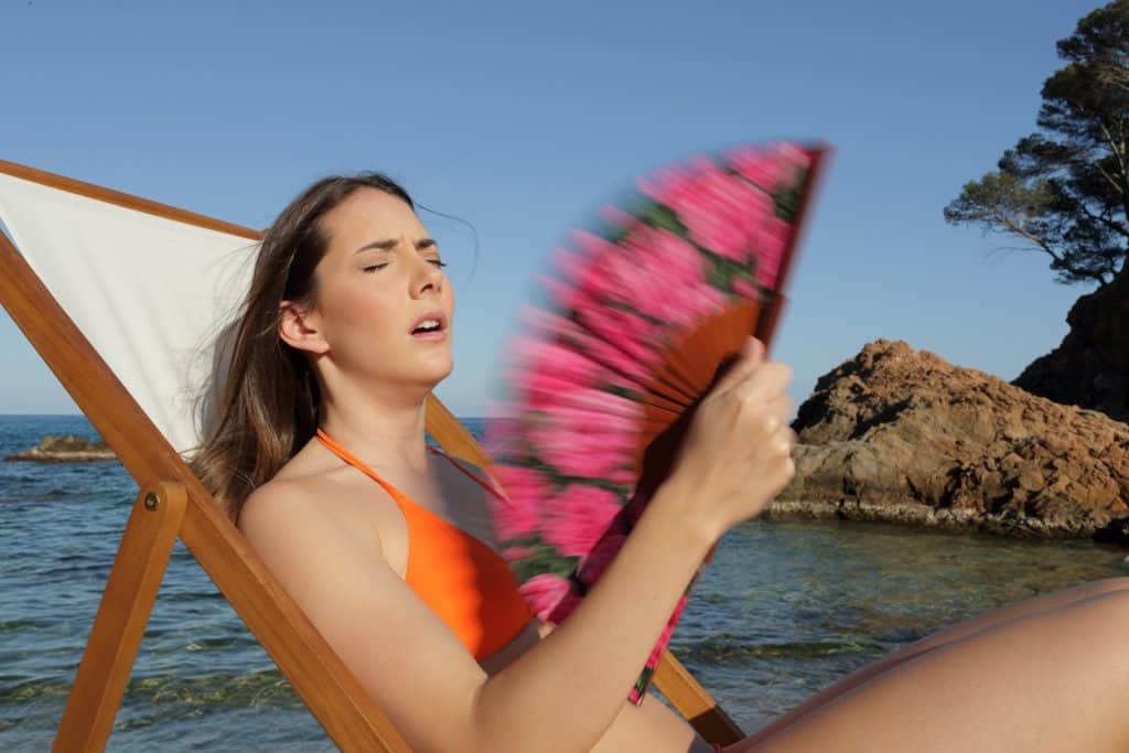 woman using a fan