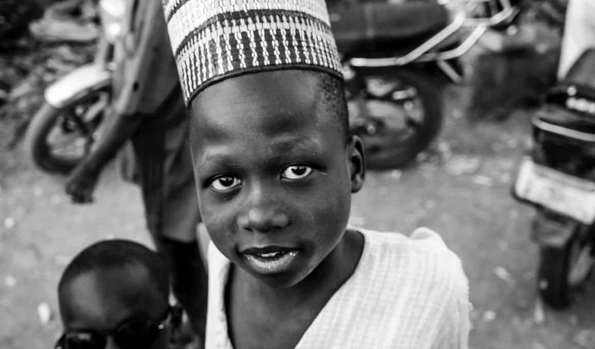 boy wearing a hat