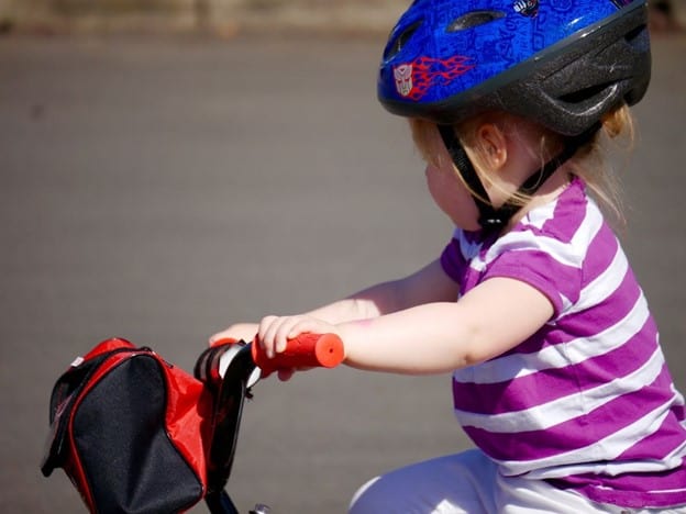 little girl riding a bike