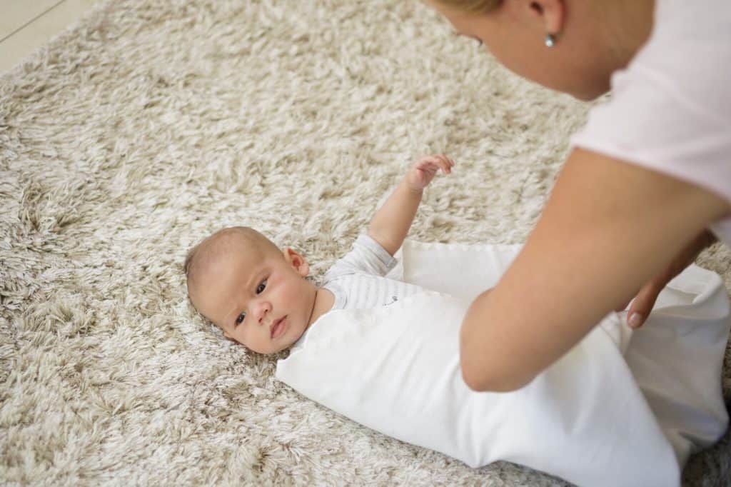 Should I Unswaddle My Baby for Nighttime Feeding? Answered