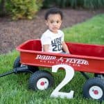 toddler on a wagon