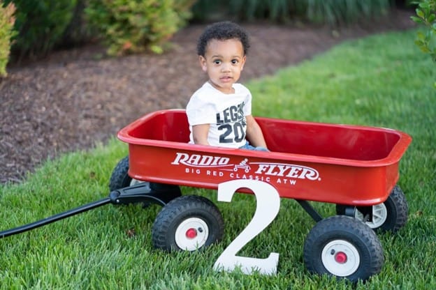 toddler on a wagon