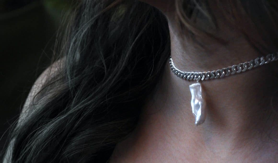 woman wearing necklace