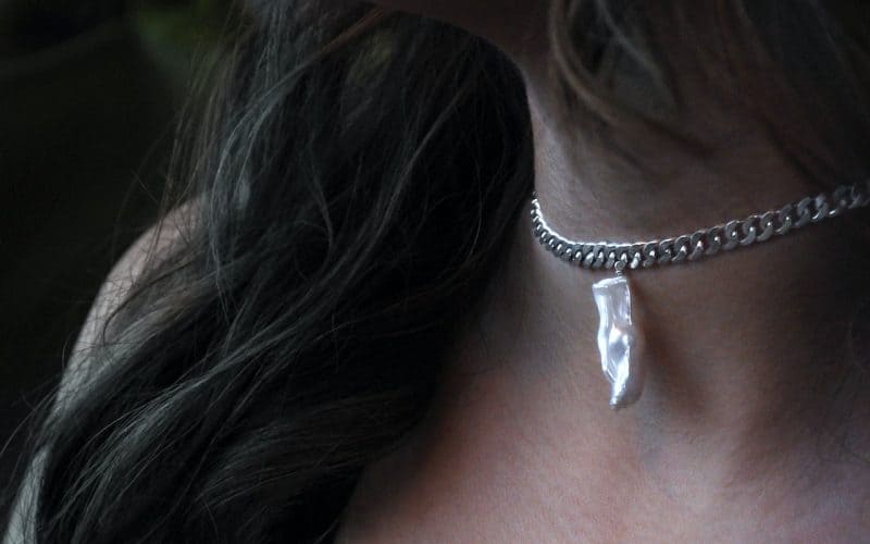 woman wearing necklace