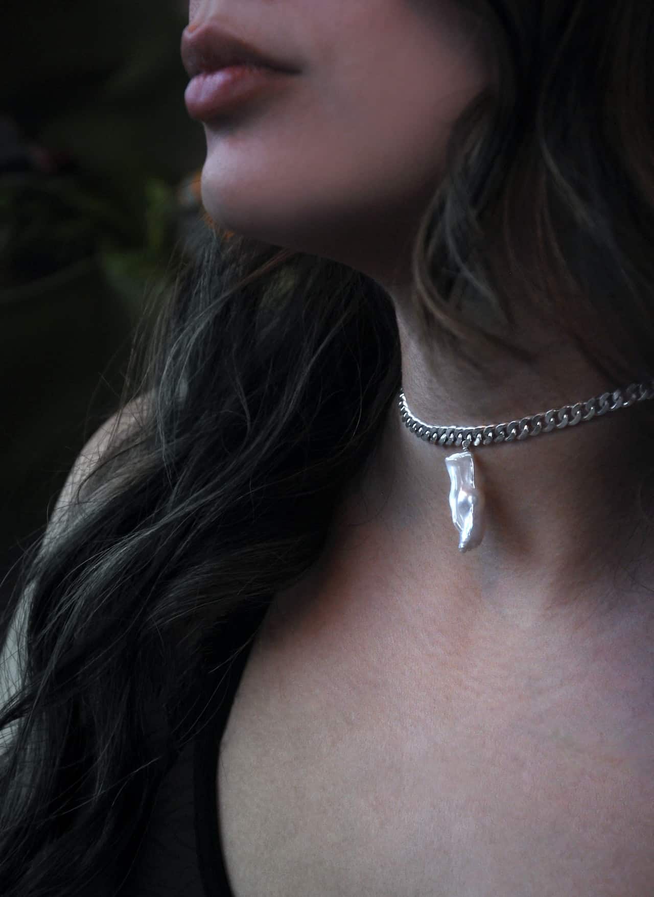woman wearing necklace