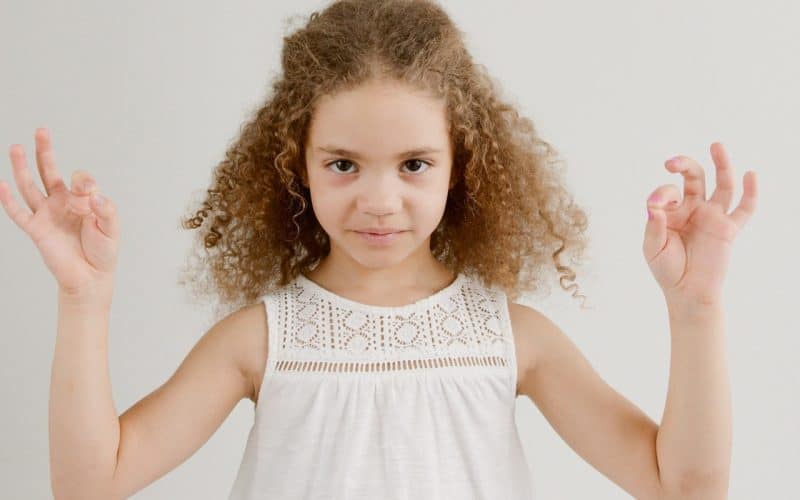 young girl with curly hair