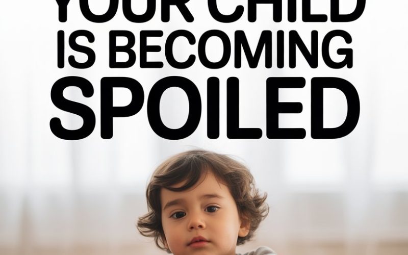 Child with serious expression surrounded by gifts, highlighting signs of spoiled behavior in kids.