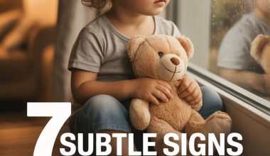 Child reflecting by window showing signs of a victim mindset.