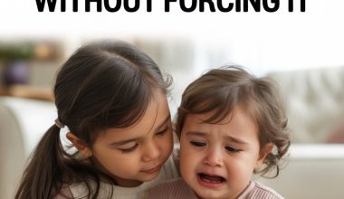 Young girl comforts crying toddler, demonstrating empathy and emotional support in a warm home setting.