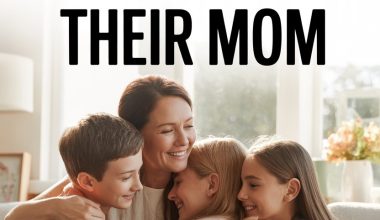 Happy mother with children sharing joyful family hug in cozy home.