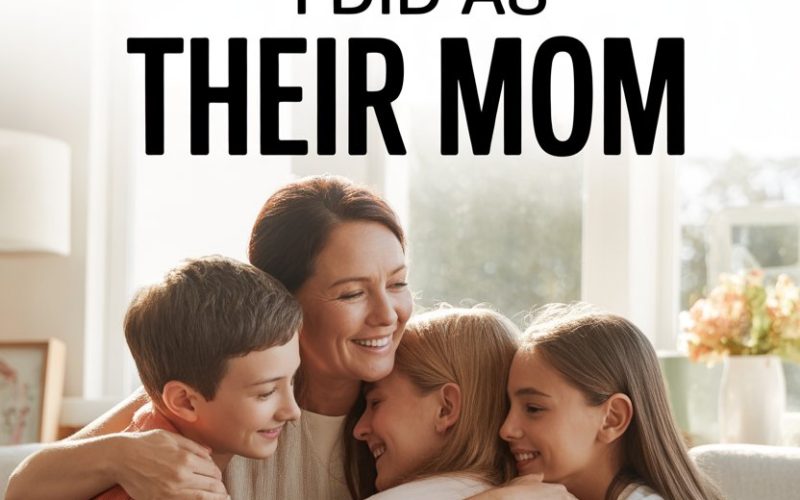 Happy mother with children sharing joyful family hug in cozy home.