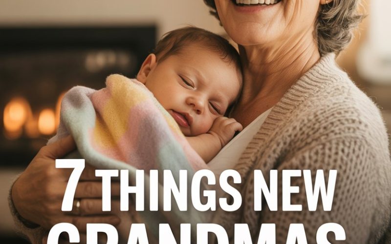 Happy grandma holding sleeping baby with rainbow blanket in cozy home environment.