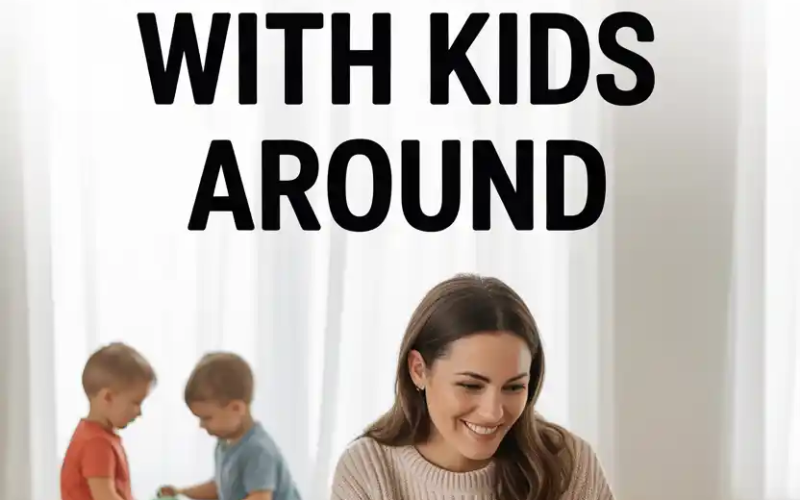 Mom working from home with kids, playing with blocks, balancing productivity and parenting.